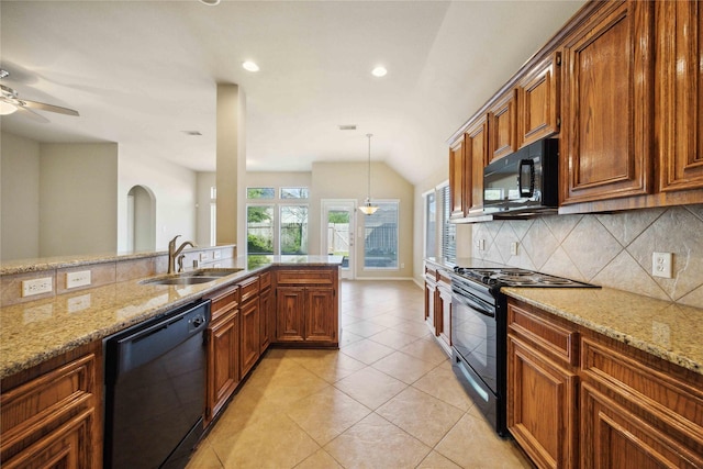 10910 Brighton Gardens Dr, Richmond, TX 77406 - kitchen featuring black appliances, a sink, decorative backsplash, ceiling fan, and light stone countertops