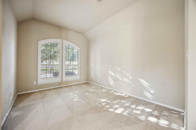 10910 Brighton Gardens Dr, Richmond, TX 77406 - carpeted empty room featuring lofted ceiling and baseboards