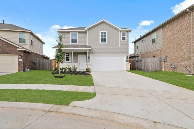 21406 George Wayne Way, Spring, TX 77379 - traditional-style house featuring board and batten siding, an attached garage, and driveway