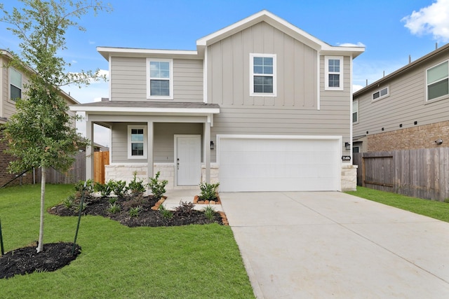 21406 George Wayne Way, Spring, TX 77379 - view of front of home featuring board and batten siding, an attached garage, stone siding, and driveway