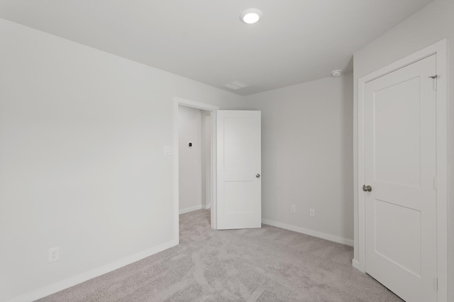 21406 George Wayne Way, Spring, TX 77379 - unfurnished bedroom with light carpet and baseboards