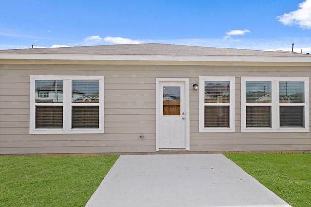 21406 George Wayne Way, Spring, TX 77379 - view of exterior entry with a patio and a yard