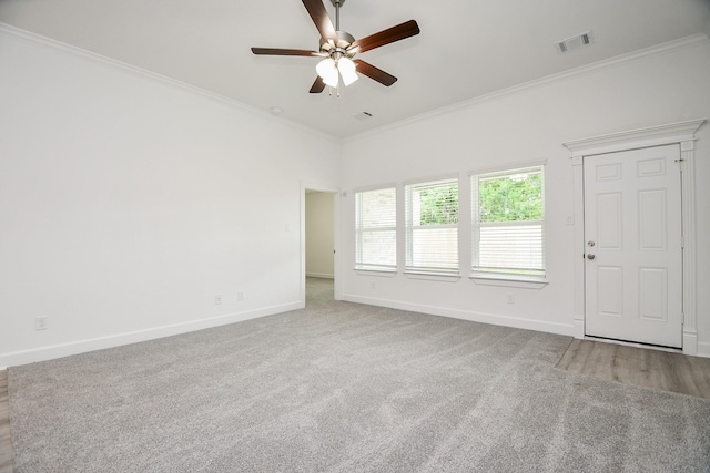 6607 Apollo, Houston, TX 77091 - unfurnished room featuring a ceiling fan, baseboards, crown molding, and carpet