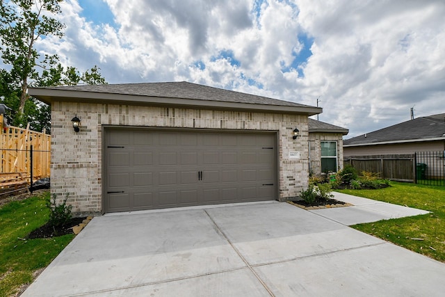 6607 Apollo, Houston, TX 77091 - garage with concrete driveway