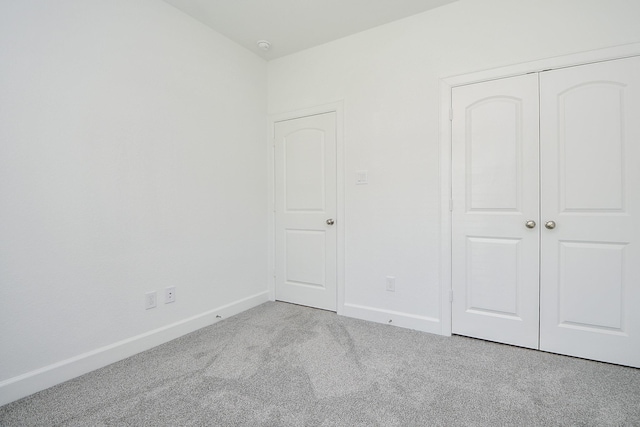6607 Apollo, Houston, TX 77091 - unfurnished bedroom with carpet, baseboards, and a closet