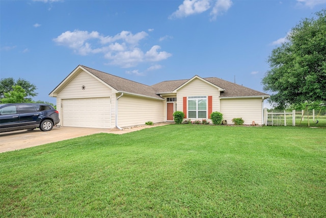 305-335 Omalley Rd, Brenham, TX 77833 - ranch-style home featuring an attached garage, driveway, and a shingled roof