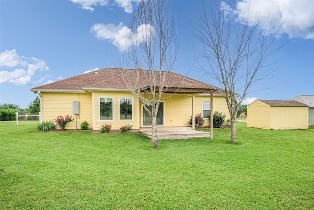 305-335 Omalley Rd, Brenham, TX 77833 - rear view of house featuring a patio area and a lawn