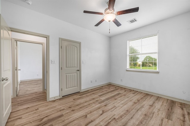 305-335 Omalley Rd, Brenham, TX 77833 - unfurnished room featuring light wood-style flooring, ceiling fan, baseboards, and a smoke detector