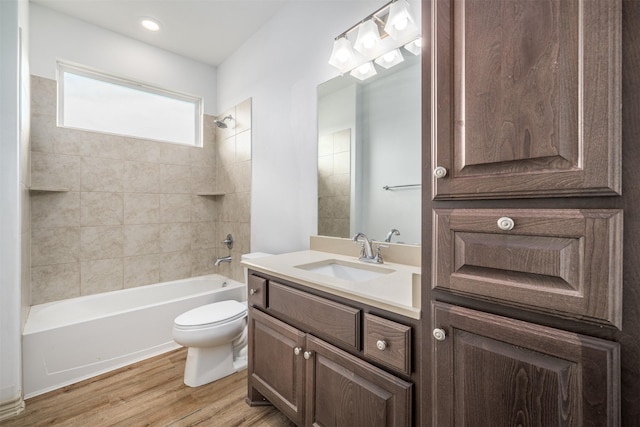 305-335 Omalley Rd, Brenham, TX 77833 - full bathroom with vanity, toilet, bathtub / shower combination, and wood finished floors