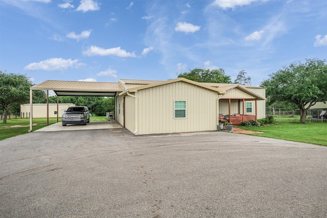 305-335 Omalley Rd, Brenham, TX 77833 - manufactured / mobile home featuring driveway, a carport, and metal roof