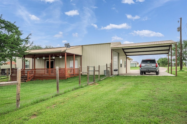 305-335 Omalley Rd, Brenham, TX 77833 - back of house with an attached carport and driveway