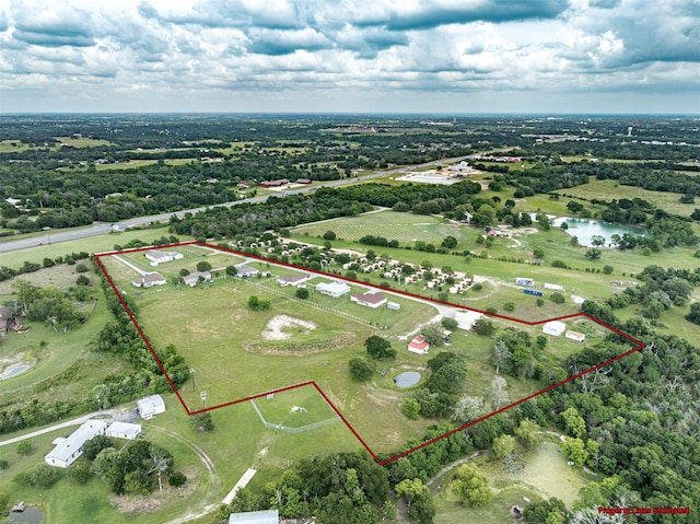 305-335 Omalley Rd, Brenham, TX 77833 - aerial view of sparsely populated area with property parcel outlined and a large body of water