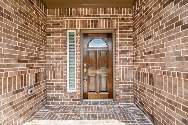 6710 Utah St, Houston, TX 77091 - doorway to property with brick siding