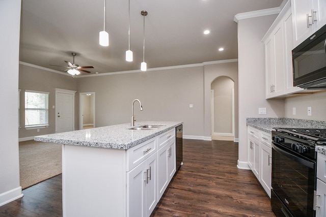 6710 Utah St, Houston, TX 77091 - kitchen featuring black appliances, a sink, arched walkways, ceiling fan, and dark wood finished floors