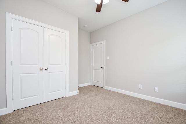 6710 Utah St, Houston, TX 77091 - unfurnished bedroom with carpet flooring, a closet, baseboards, and ceiling fan