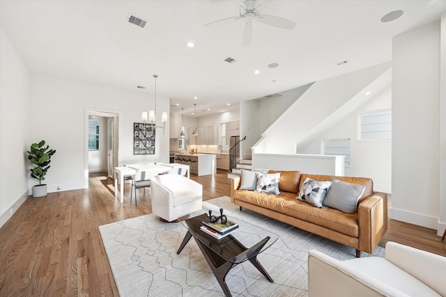 4232 Feagan St, Houston, TX 77007 - living area with ceiling fan, light wood finished floors, baseboards, and recessed lighting