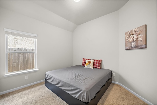 5442 Atwood Canyon Ct, Richmond, TX 77407 - carpeted bedroom featuring baseboards and lofted ceiling
