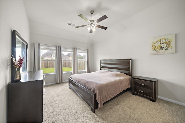 5442 Atwood Canyon Ct, Richmond, TX 77407 - bedroom with light colored carpet, baseboards, vaulted ceiling, and ceiling fan