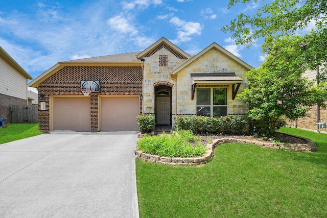 13906 Mowbray Ct, Richmond, TX 77407 - view of front of home with driveway, stone siding, and a front yard