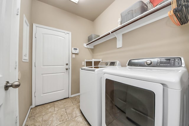 13906 Mowbray Ct, Richmond, TX 77407 - washroom with washing machine and clothes dryer and baseboards