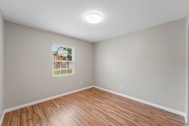 1405 Shadowdale Dr Unit 73, Houston, TX 77043 - spare room featuring light wood finished floors and baseboards