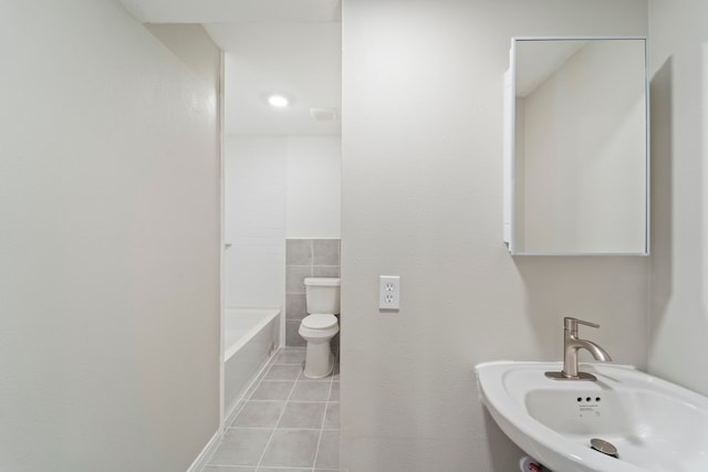 1405 Shadowdale Dr Unit 73, Houston, TX 77043 - full bathroom with a sink, tile patterned floors, and toilet