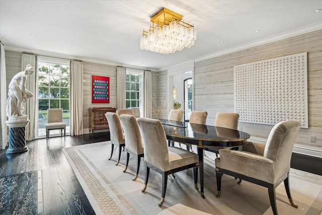 2307 River Oaks Blvd, Houston, TX 77019 - dining area with wood finished floors, crown molding, a chandelier, and wood walls