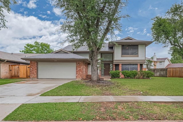2115 Streamcrest Ln, Sugar Land, TX 77479 - view of front of house with a garage, brick siding, and concrete driveway