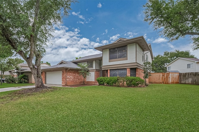 2115 Streamcrest Ln, Sugar Land, TX 77479 - split level home with brick siding, driveway, and an attached garage