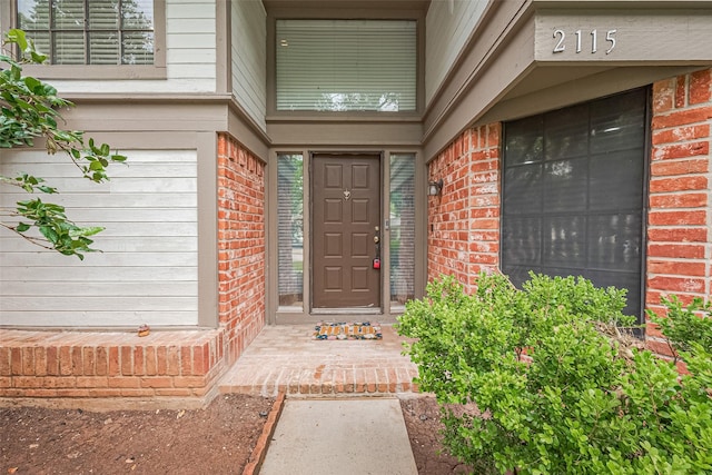2115 Streamcrest Ln, Sugar Land, TX 77479 - property entrance with brick siding