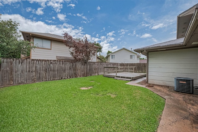 2115 Streamcrest Ln, Sugar Land, TX 77479 - view of yard with central air condition unit and a wooden deck