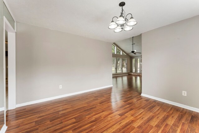 4807 Wind Chimes Dr, Houston, TX 77066 - unfurnished room with a chandelier, wood finished floors, vaulted ceiling, baseboards, and ceiling fan