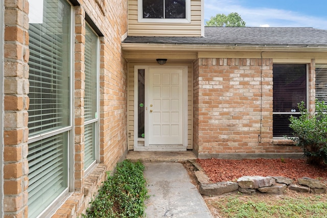 4807 Wind Chimes Dr, Houston, TX 77066 - entrance to property with brick siding and roof with shingles
