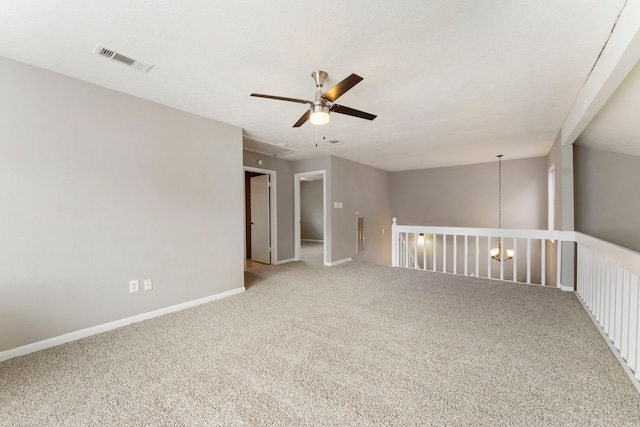 4807 Wind Chimes Dr, Houston, TX 77066 - unfurnished room with carpet, attic access, a ceiling fan, and baseboards