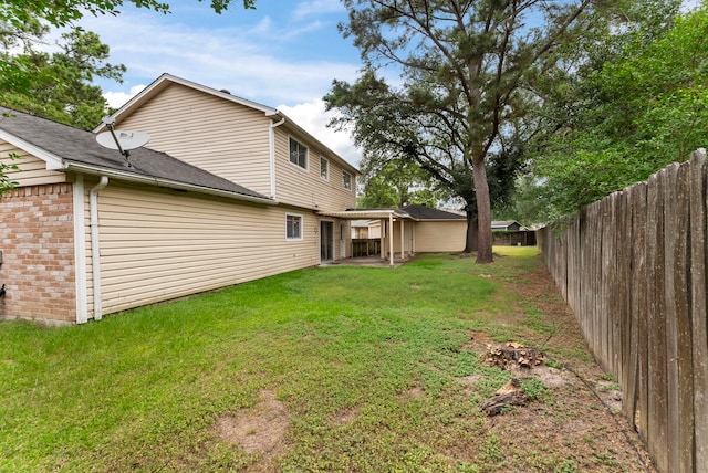 4807 Wind Chimes Dr, Houston, TX 77066 - view of yard featuring a patio