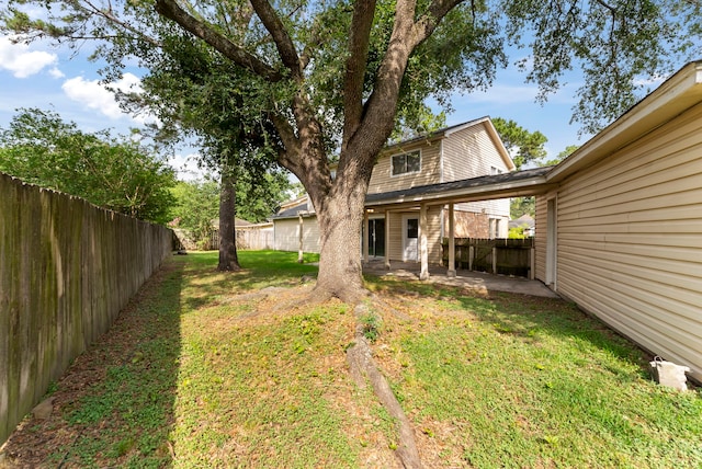 4807 Wind Chimes Dr, Houston, TX 77066 - view of yard featuring a patio