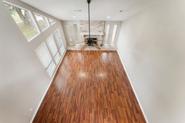 4807 Wind Chimes Dr, Houston, TX 77066 - unfurnished living room with baseboards and wood finished floors