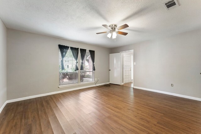 4807 Wind Chimes Dr, Houston, TX 77066 - spare room featuring a ceiling fan, wood finished floors, baseboards, and a textured ceiling