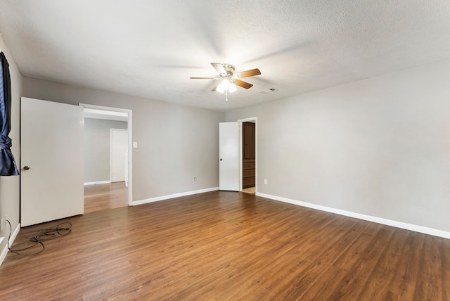 4807 Wind Chimes Dr, Houston, TX 77066 - empty room with a ceiling fan, baseboards, and wood finished floors
