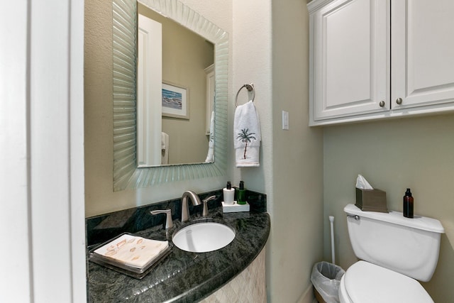 4115 Sand Hill Ct, Galveston, TX 77554 - bathroom featuring toilet and vanity