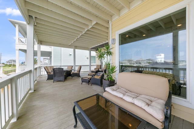 4115 Sand Hill Ct, Galveston, TX 77554 - deck with outdoor dining area and a water view