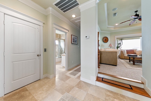 4115 Sand Hill Ct, Galveston, TX 77554 - hallway with crown molding, attic access, baseboards, recessed lighting, and a raised ceiling