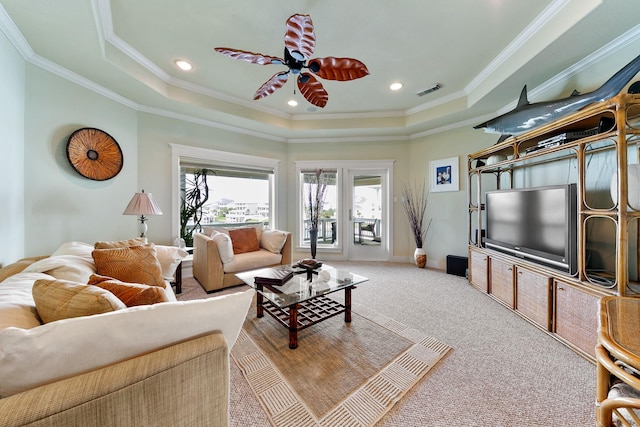4115 Sand Hill Ct, Galveston, TX 77554 - living area with a tray ceiling, carpet flooring, ornamental molding, a ceiling fan, and recessed lighting