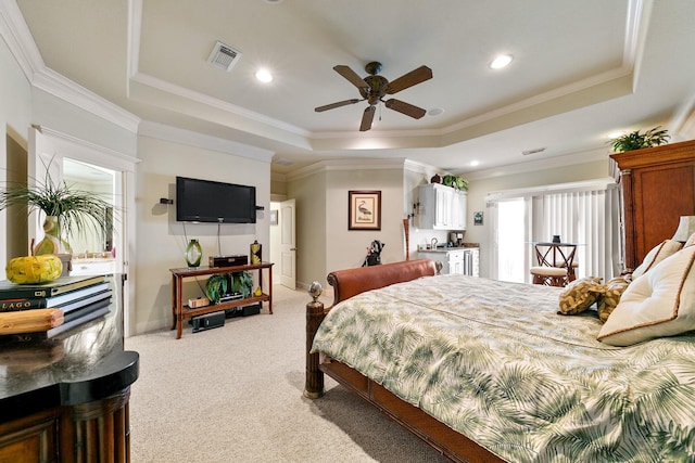 4115 Sand Hill Ct, Galveston, TX 77554 - carpeted bedroom with a tray ceiling, recessed lighting, crown molding, a ceiling fan, and baseboards