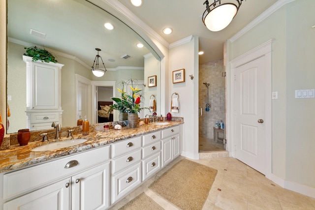 4115 Sand Hill Ct, Galveston, TX 77554 - full bathroom featuring a shower stall, double vanity, ornamental molding, baseboards, and tile patterned flooring