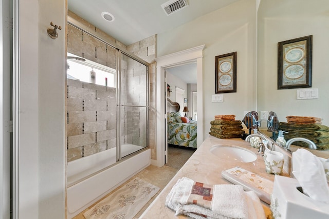 4115 Sand Hill Ct, Galveston, TX 77554 - bathroom featuring enclosed tub / shower combo and vanity