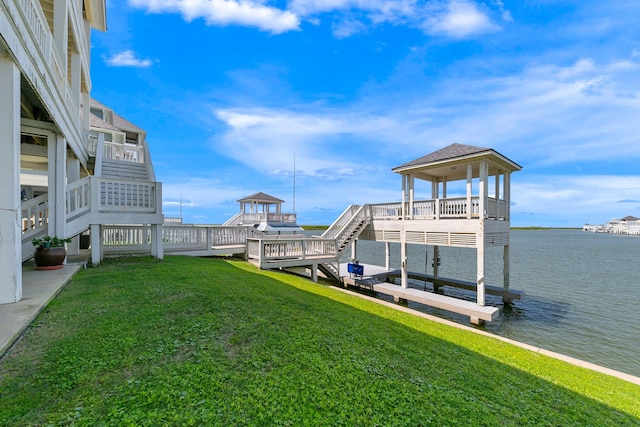 4115 Sand Hill Ct, Galveston, TX 77554 - view of green lawn featuring a water view and stairs