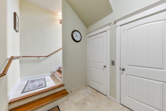 4115 Sand Hill Ct, Galveston, TX 77554 - staircase featuring baseboards