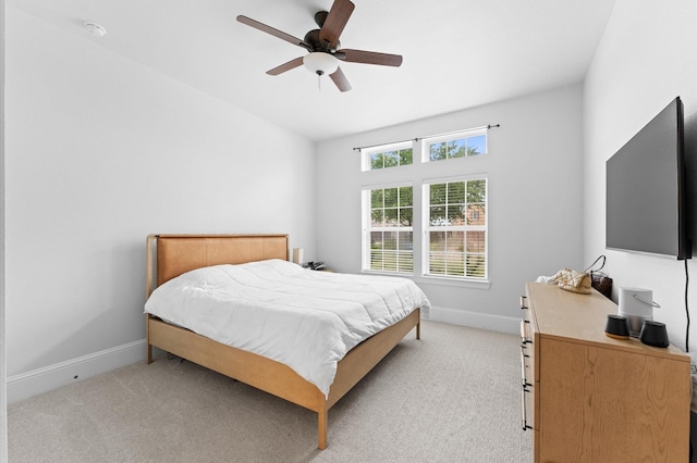 10110 Da Vinci Ct, Iowa Colony, TX 77583 - bedroom featuring light colored carpet, baseboards, and ceiling fan