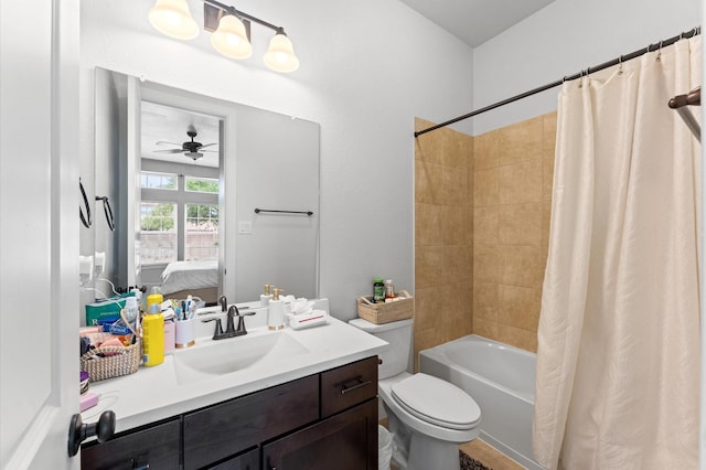 10110 Da Vinci Ct, Iowa Colony, TX 77583 - ensuite bathroom featuring vanity, shower / bath combo with shower curtain, ceiling fan, and toilet